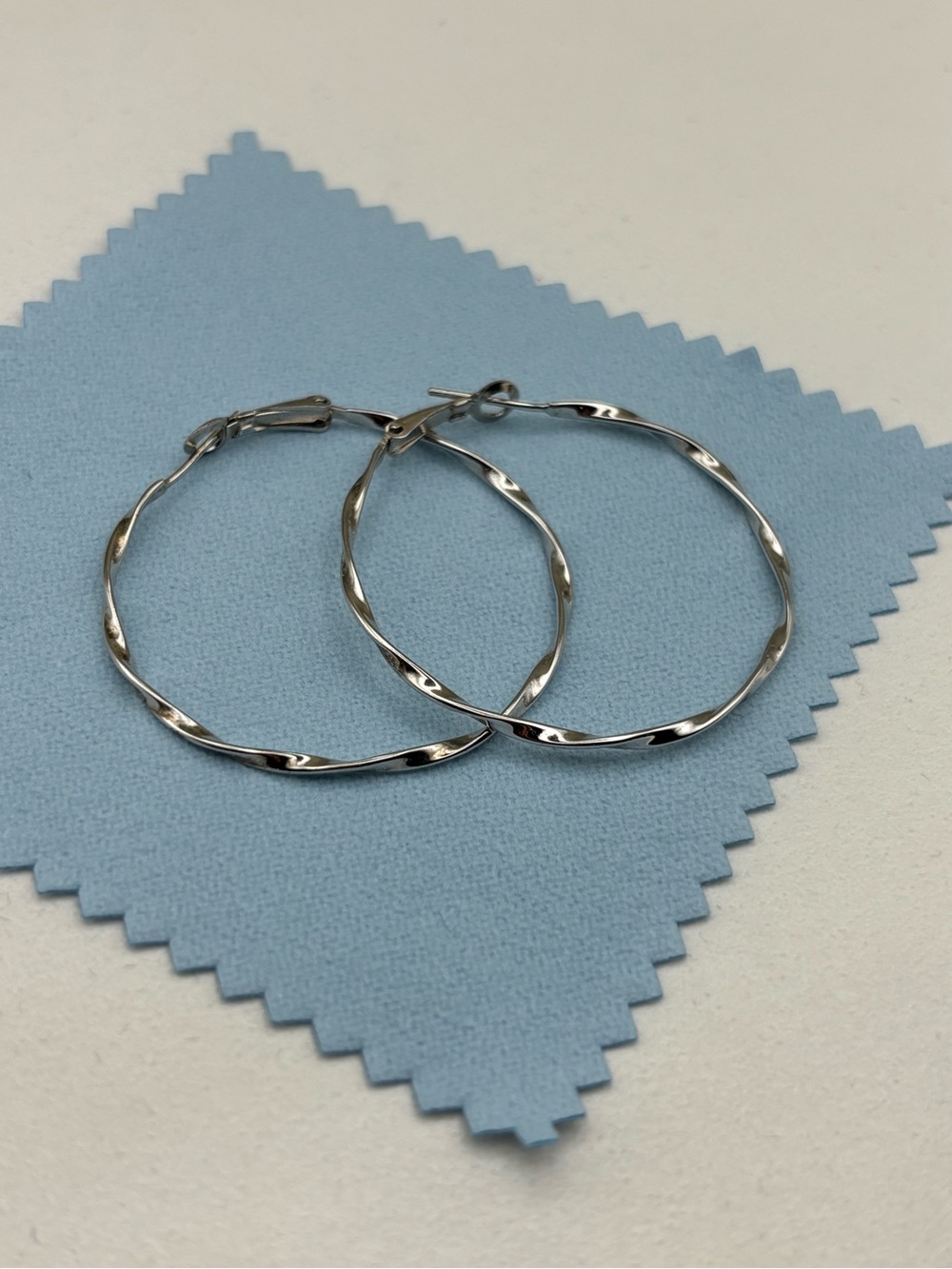 Sterling-Tone Twisted Hoop Earrings - Silver